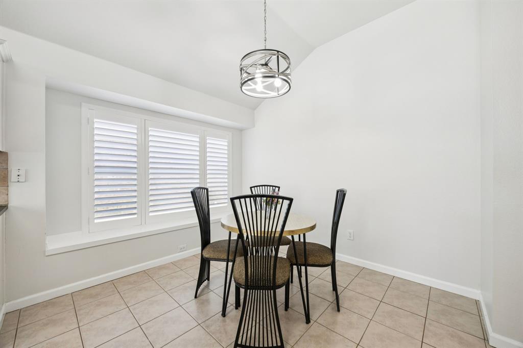 3012 Mason Avenue Corinth, TX 76210 - Photo 7 of 28 a view of a dining room with furniture and window