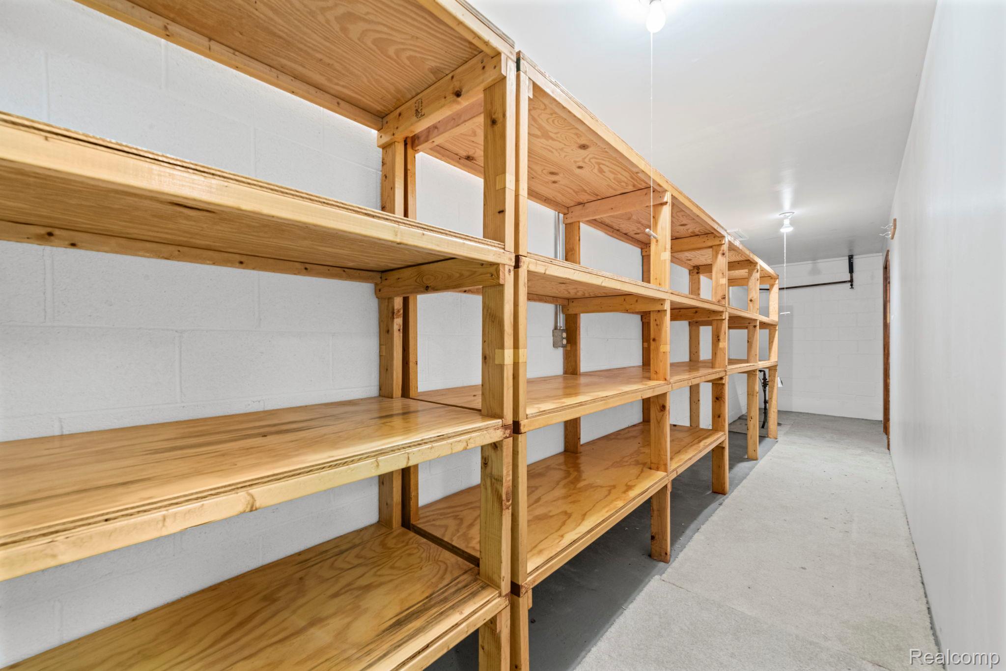 21580 Georgetown Road Trenton, MI 48183 - Photo 26 of 36 Extensive built-in wood shelving units provide generous storage capacity
