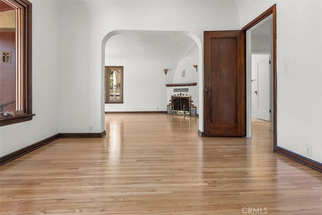 3569 Bandini Avenue Riverside, CA 92506 - Photo 11 of 51 a view of a livingroom with wooden floor and a bathroom