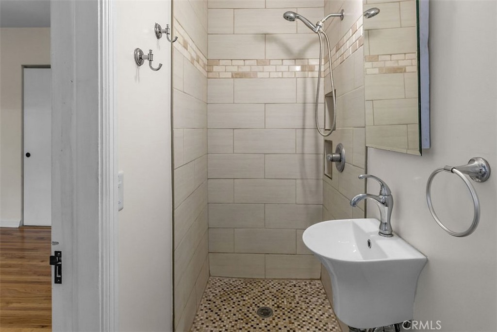 3569 Bandini Avenue Riverside, CA 92506 - Photo 18 of 51 a bathroom with a sink a toilet and shower
