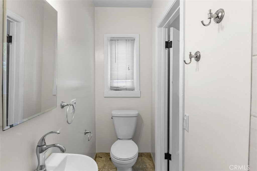 3569 Bandini Avenue Riverside, CA 92506 - Photo 19 of 51 a bathroom with a toilet and a shower