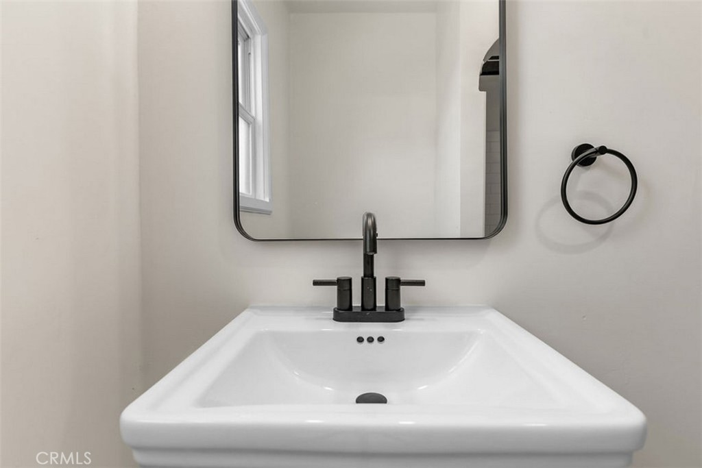 3569 Bandini Avenue Riverside, CA 92506 - Photo 28 of 51 a bathroom with a sink and a mirror