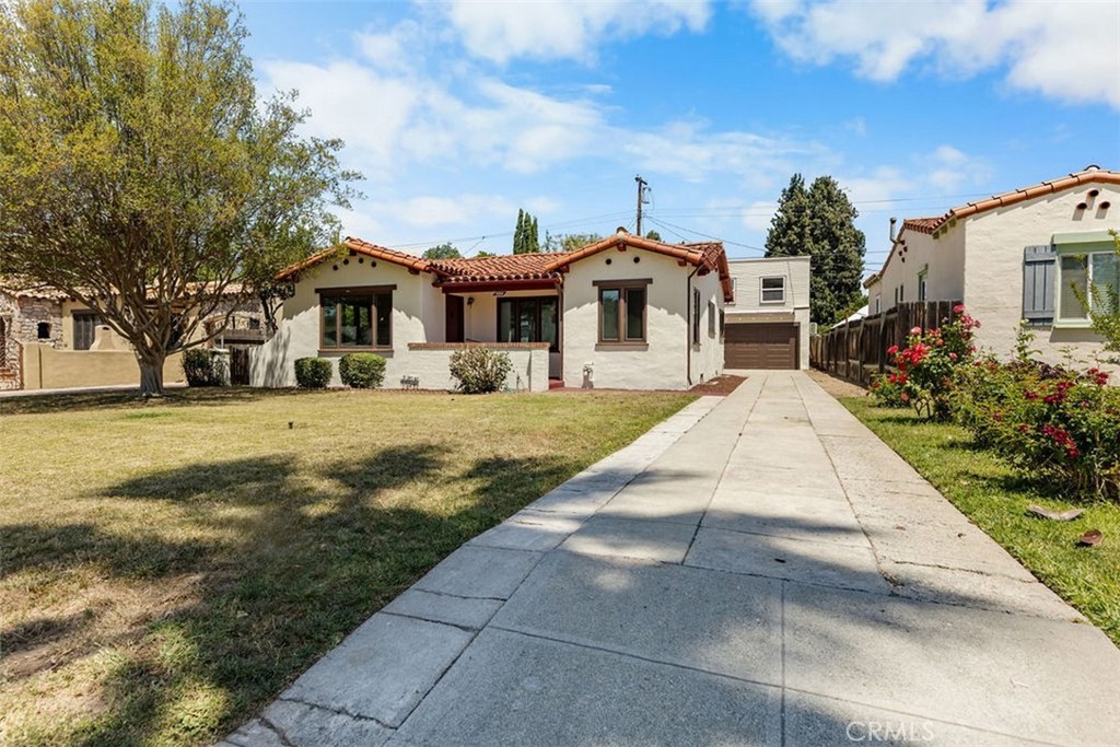 3569 Bandini Avenue Riverside, CA 92506 - Photo 3 of 51 a front view of a house with a yard