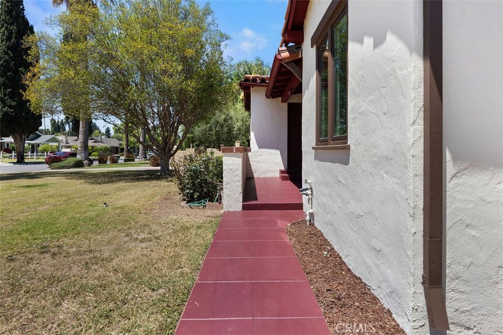 3569 Bandini Avenue Riverside, CA 92506 - Photo 4 of 51 a view of a pathway both side of the house