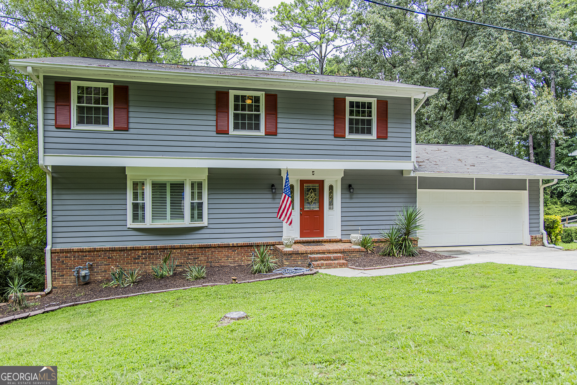 5 Lenox Circle Rome, GA 30161 - Photo 1 of 1 a front view of a house with a yard and garage