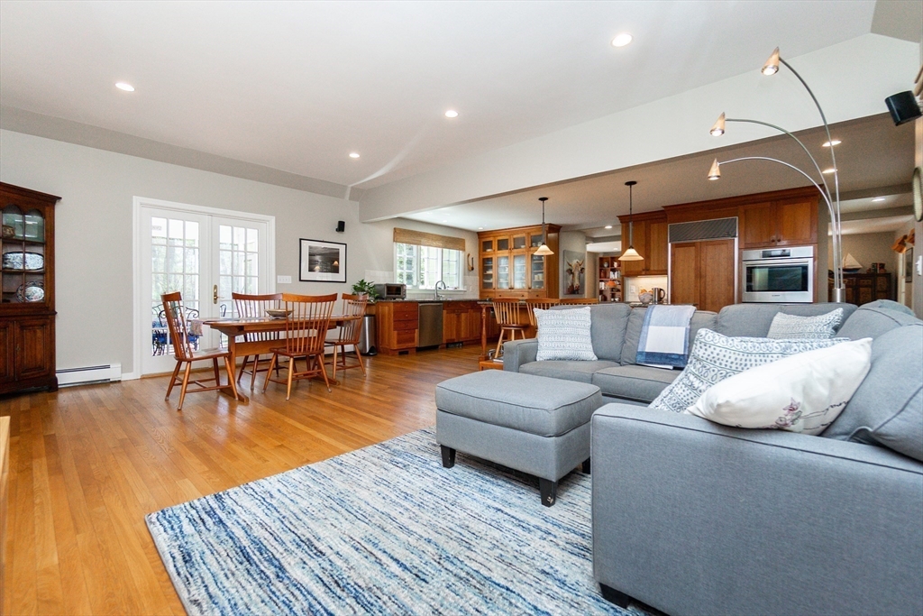 133 Glezen Lane Wayland, MA 01778 - Photo 11 of 30 a living room with furniture and wooden floor