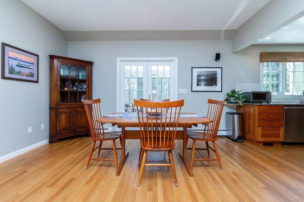 133 Glezen Lane Wayland, MA 01778 - Photo 12 of 30 a dining room with furniture and wooden floor