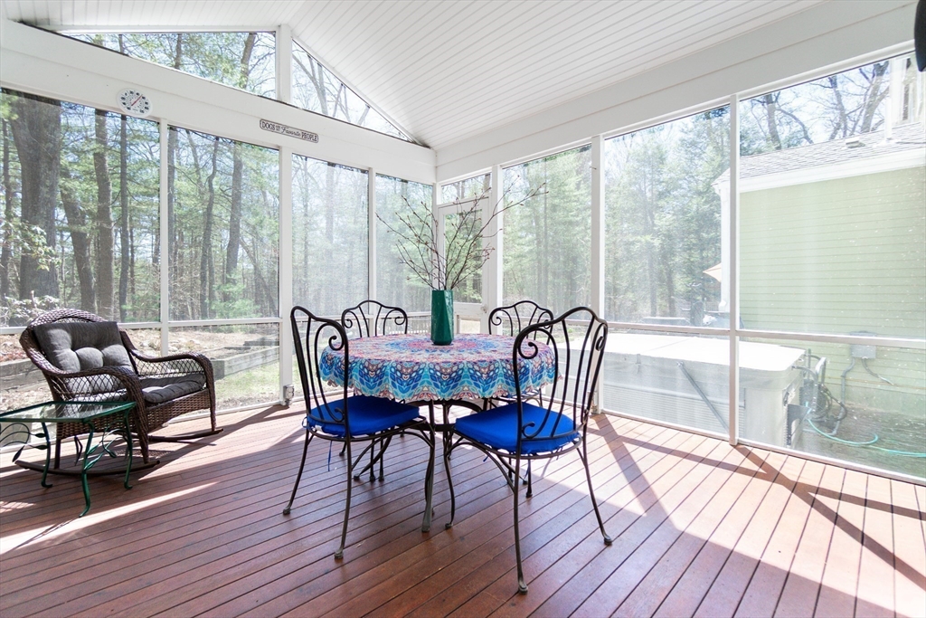 133 Glezen Lane Wayland, MA 01778 - Photo 13 of 30 a view of a dining room with furniture window and wooden floor