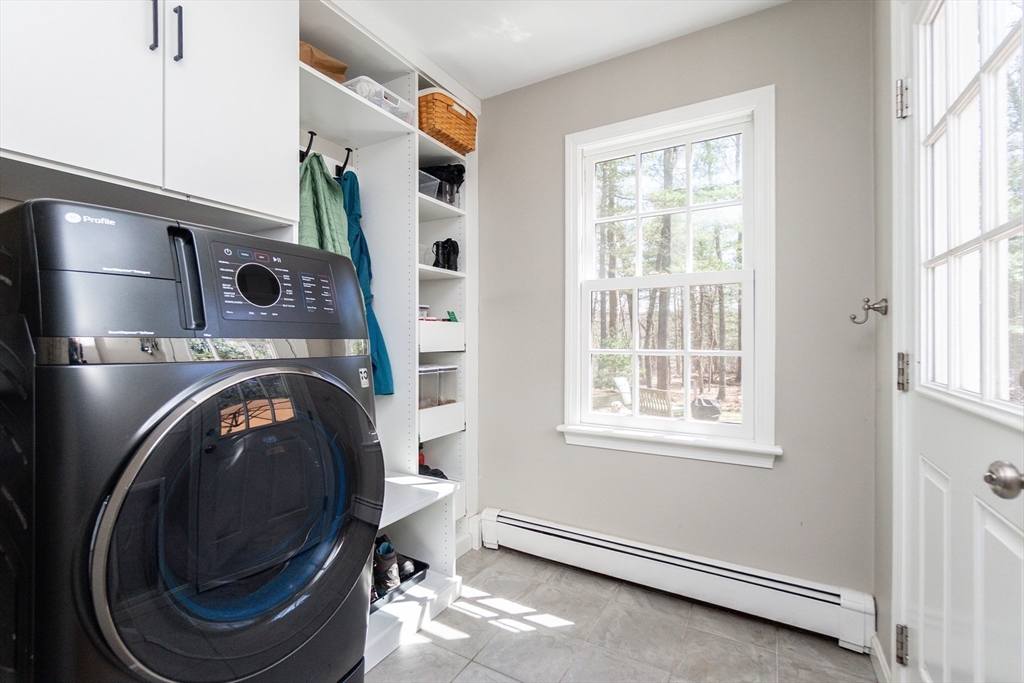 133 Glezen Lane Wayland, MA 01778 - Photo 14 of 30 a utility room with dryer and washer