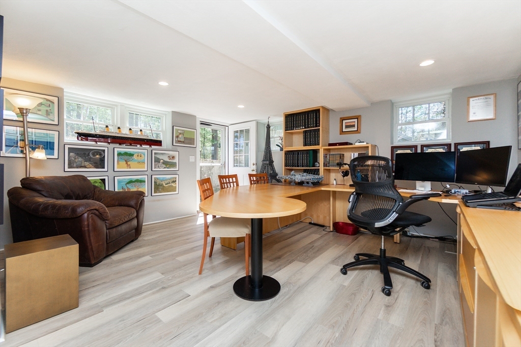 133 Glezen Lane Wayland, MA 01778 - Photo 22 of 30 a view of a livingroom with workspace and a couch