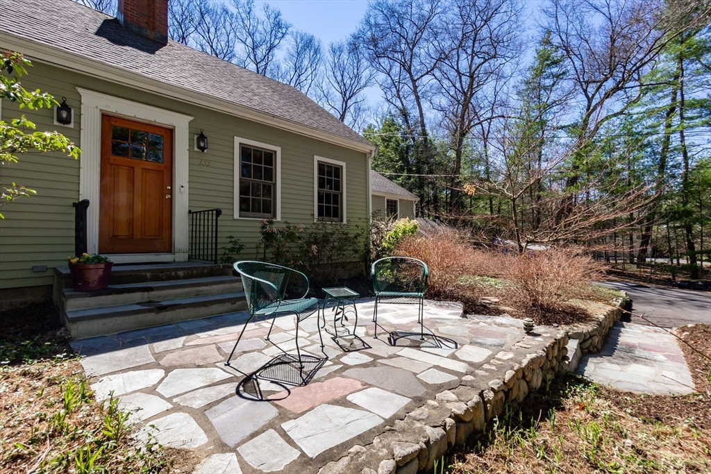 133 Glezen Lane Wayland, MA 01778 - Photo 27 of 30 a view of backyard of house with outdoor seating