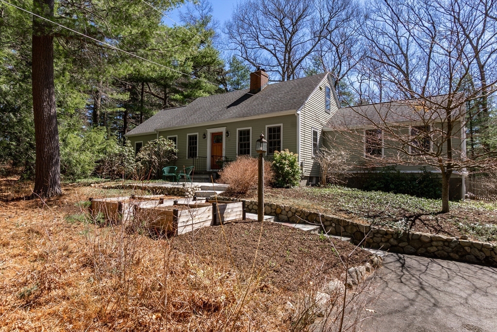 133 Glezen Lane Wayland, MA 01778 - Photo 28 of 30 a view of a house with backyard and sitting area