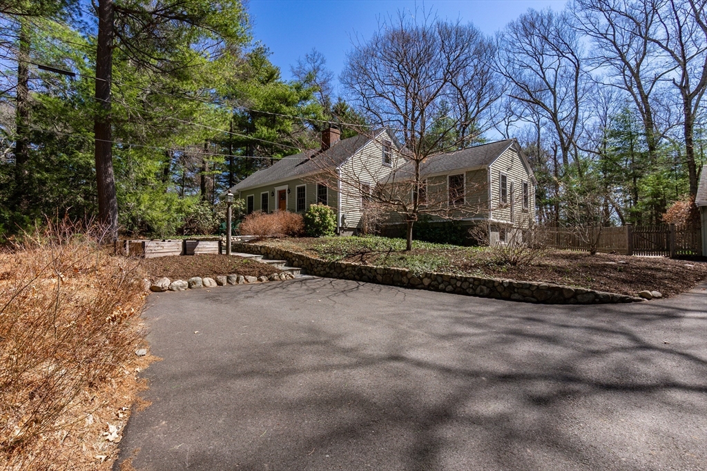 133 Glezen Lane Wayland, MA 01778 - Photo 30 of 30 a front view of a house with a yard and garage