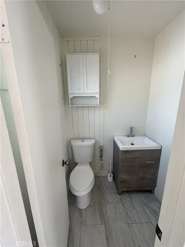 a bathroom with a sink and a toilet