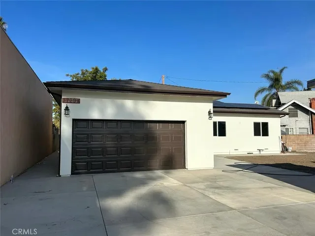 a view of a house with a garage