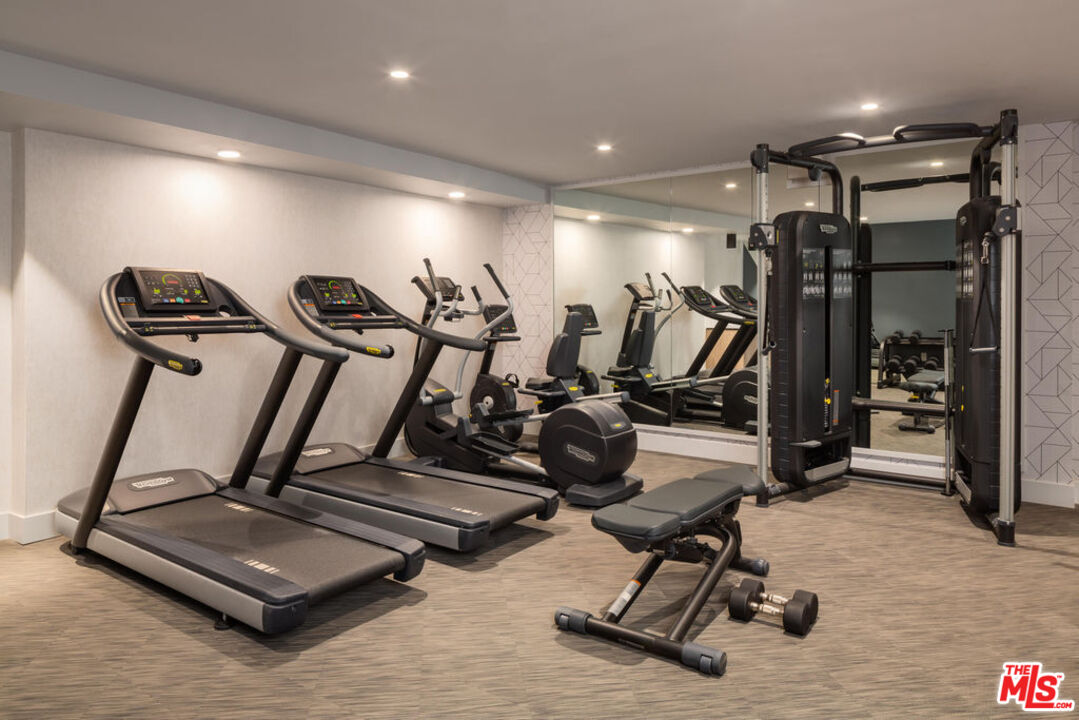 12431 Rochester Avenue, Unit 102 Los Angeles, CA 90025 - Photo 25 of 28 a view of a room with gym equipment