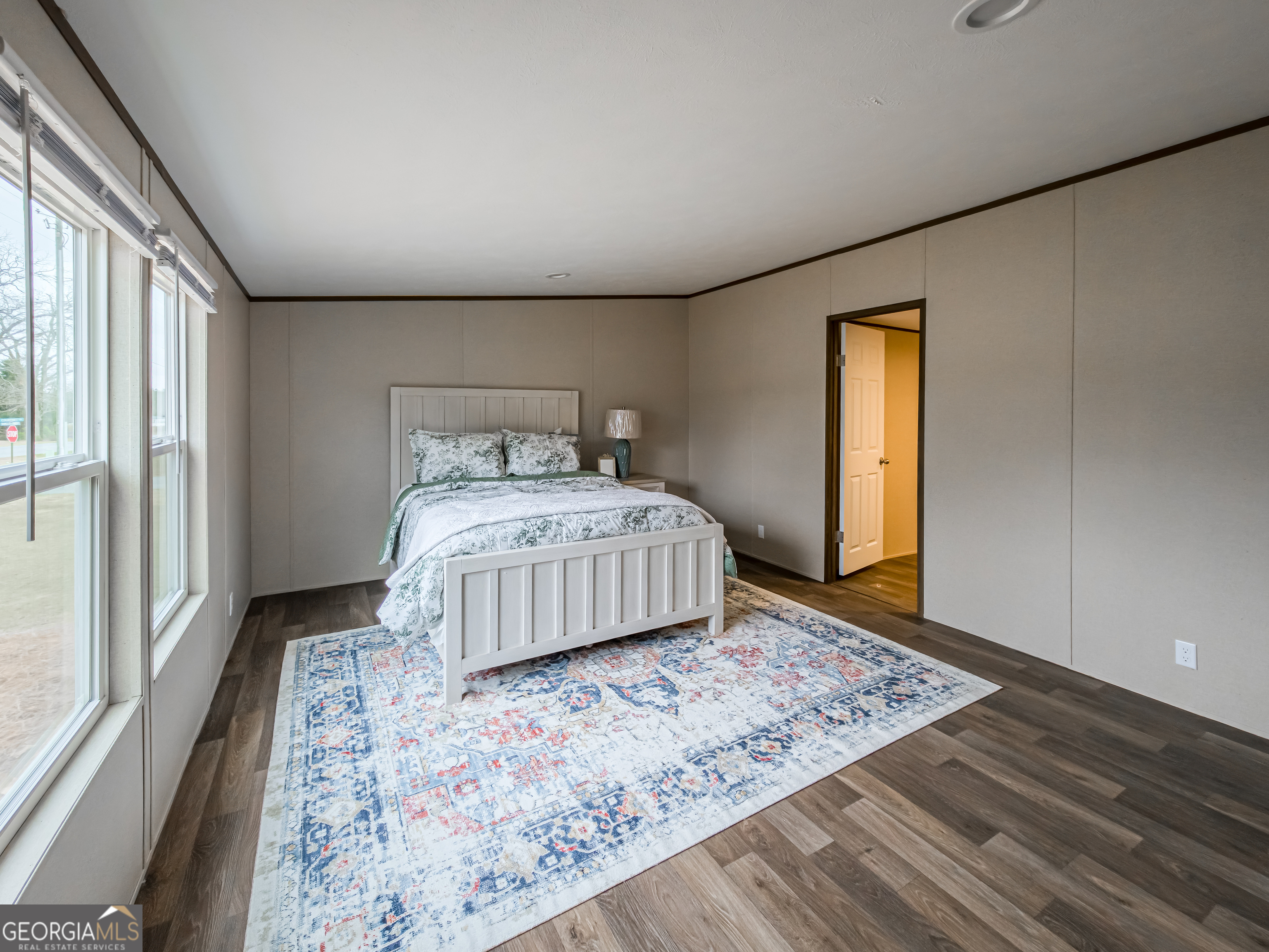 102 Courtney Circle Sumner, GA 31789 - Photo 16 of 32 a bedroom with a bed and a window