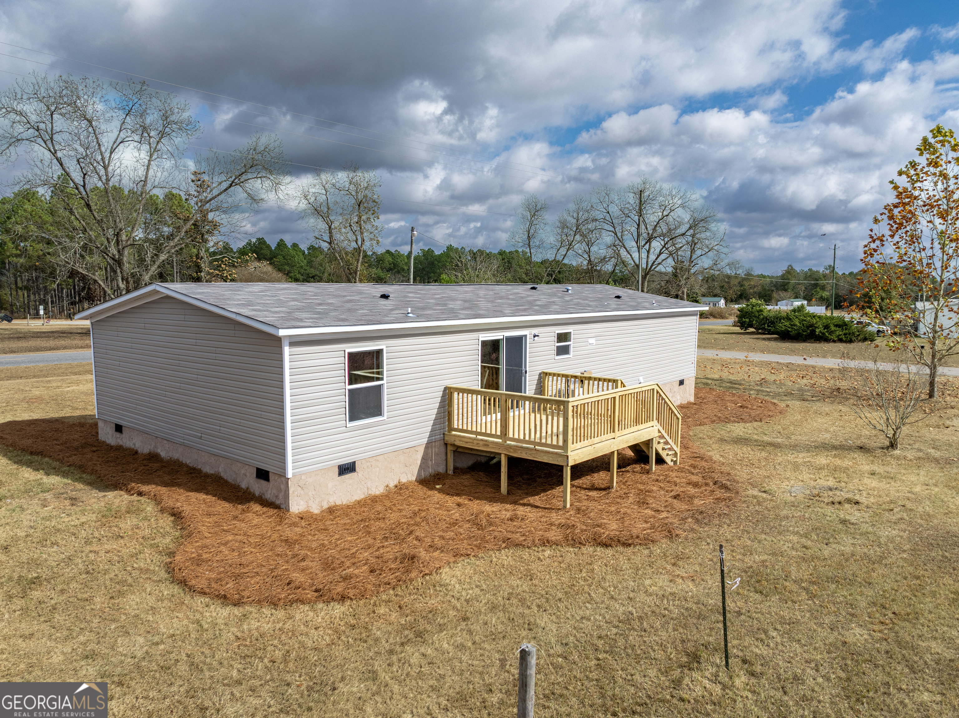 102 Courtney Circle Sumner, GA 31789 - Photo 30 of 32 a view of a house with a yard