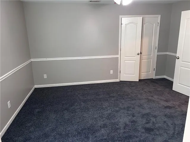 an empty room with closet