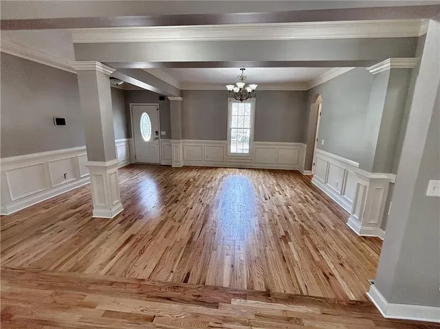 a view of livingroom with hardwood floor and a ceiling fan