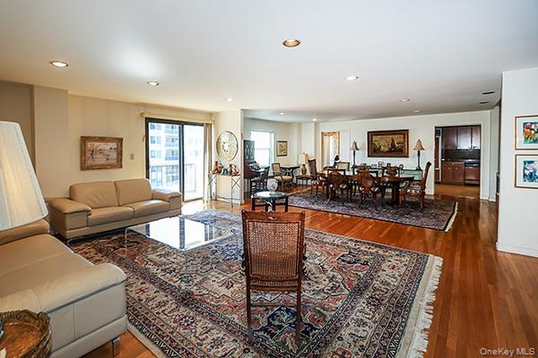 360 Shore Road, Unit 6L & 6M Long Beach, NY 11561 - Photo 11 of 33 a living room with furniture wooden floor and a window