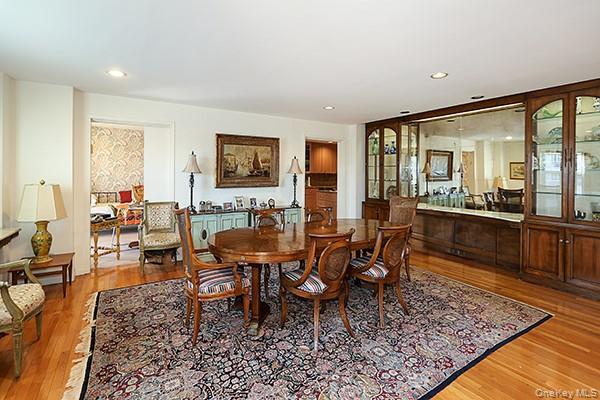 360 Shore Road, Unit 6L & 6M Long Beach, NY 11561 - Photo 12 of 33 a view of a dining room with furniture