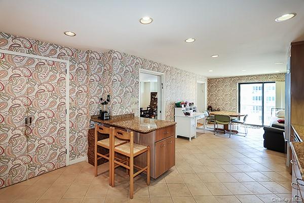 360 Shore Road, Unit 6L & 6M Long Beach, NY 11561 - Photo 20 of 33 a living room with furniture and a large window