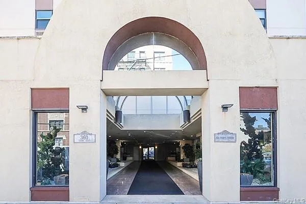 a view of a lobby with potted plants