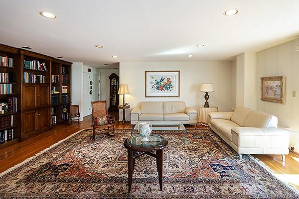 360 Shore Road, Unit 6L & 6M Long Beach, NY 11561 - Photo 9 of 33 a living room with furniture a rug and a table