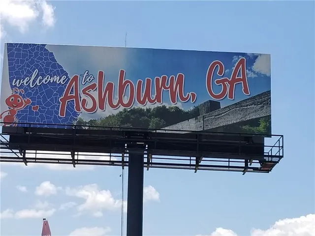 a view of a chairs and table in the kitchen