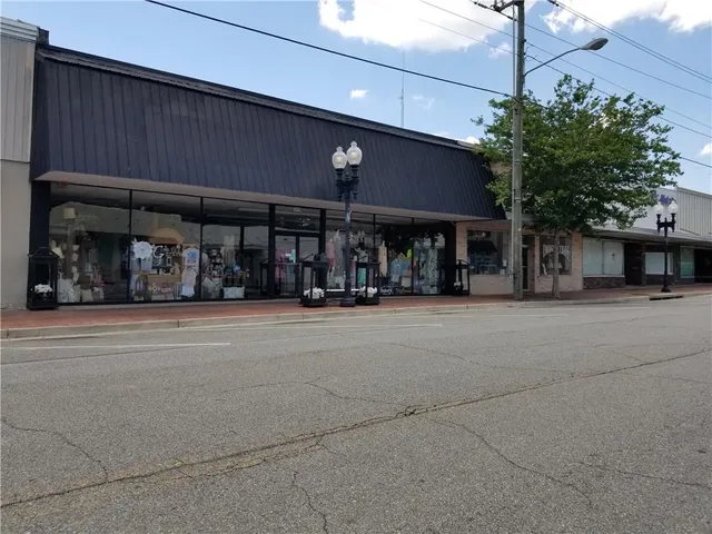 a view of a building with a street