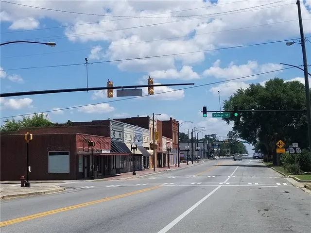 a sign that is on the side of the road