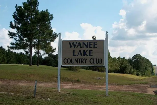 a view of a golf course with a trees