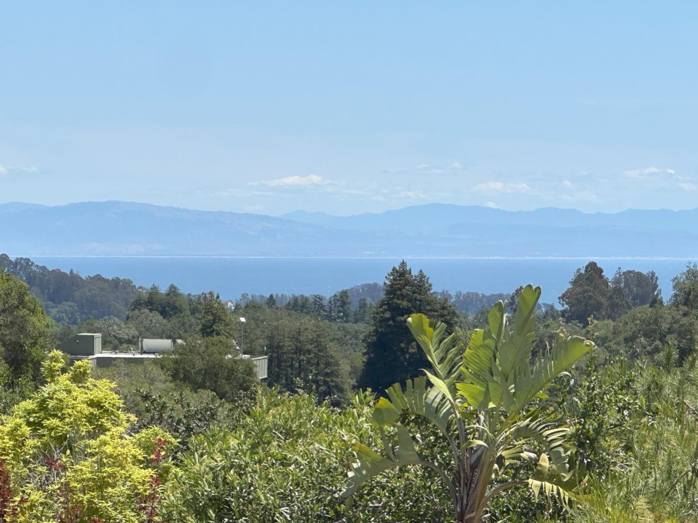220 Hidden Valley Ridge Soquel, CA 95073 - Photo 1 of 66 a view of a lake with a mountain in the background