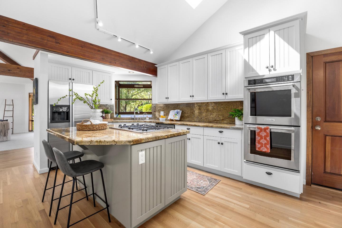 220 Hidden Valley Ridge Soquel, CA 95073 - Photo 11 of 66 a kitchen with stainless steel appliances granite countertop a stove a sink and a refrigerator