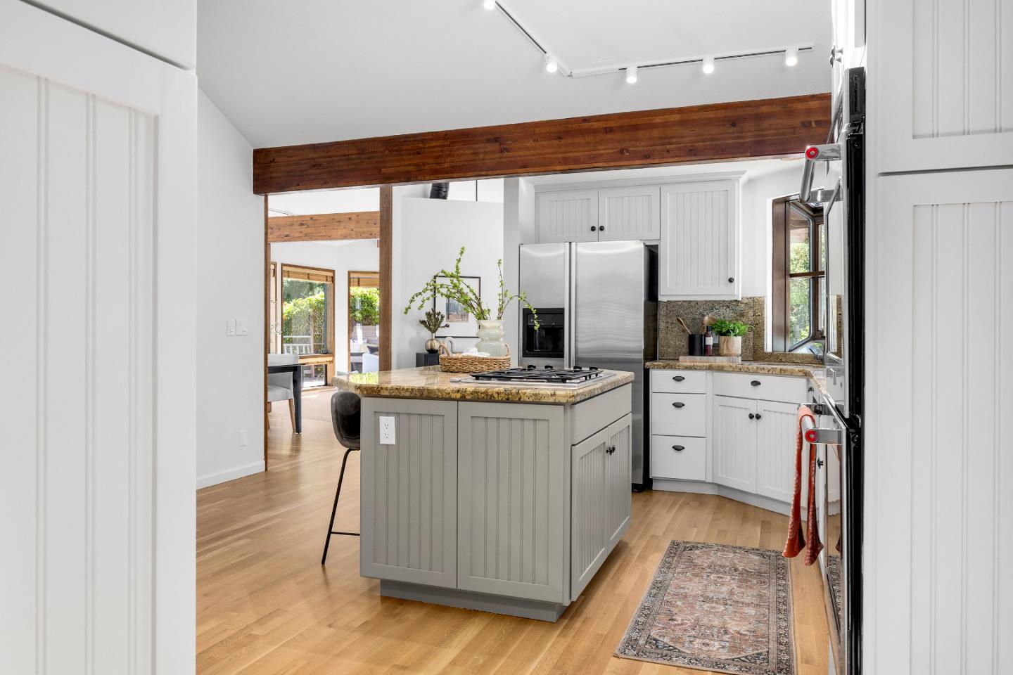 220 Hidden Valley Ridge Soquel, CA 95073 - Photo 13 of 66 a kitchen with stainless steel appliances granite countertop a stove a sink and a refrigerator