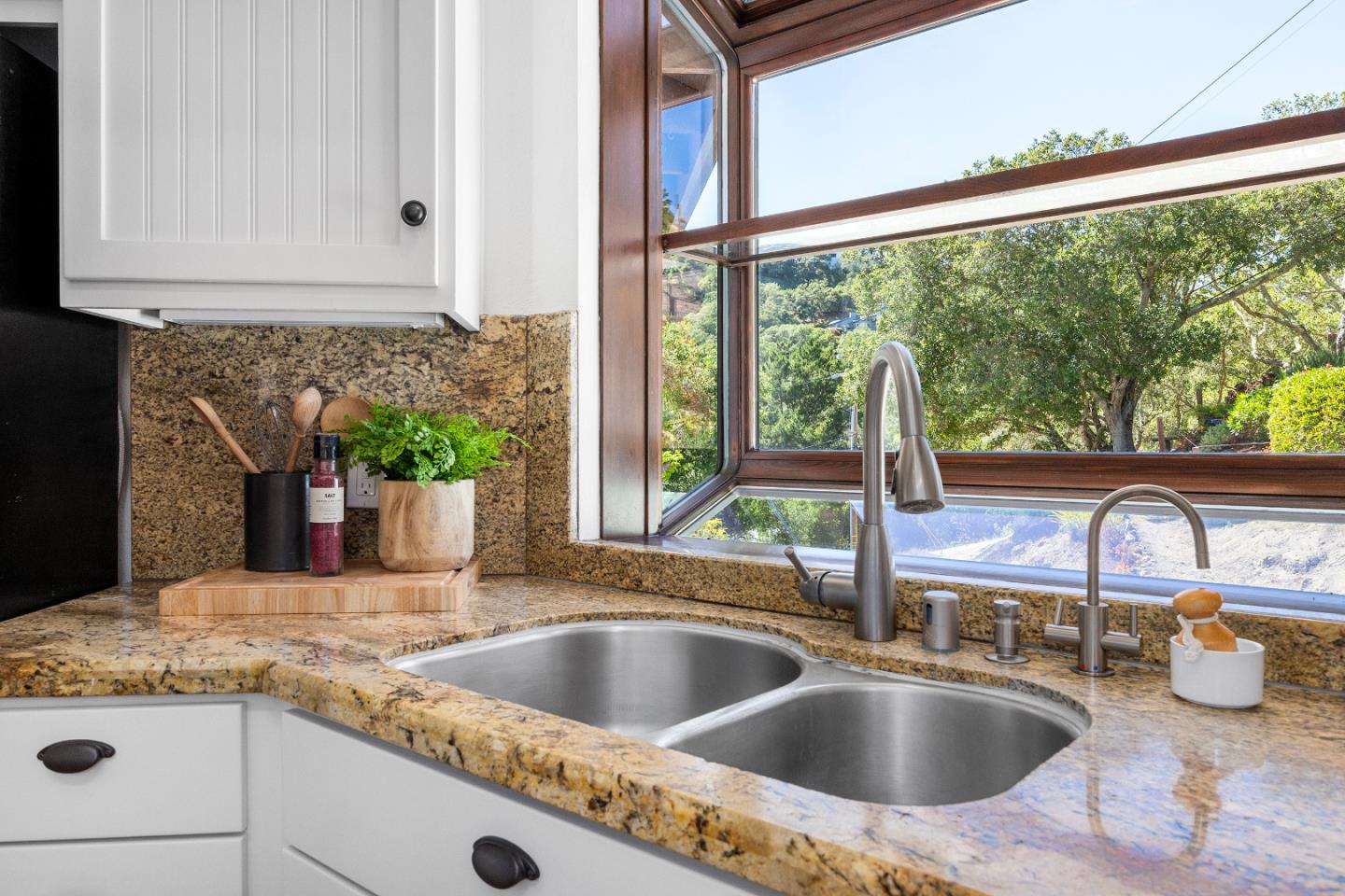 220 Hidden Valley Ridge Soquel, CA 95073 - Photo 15 of 66 a kitchen sink with a granite countertop window