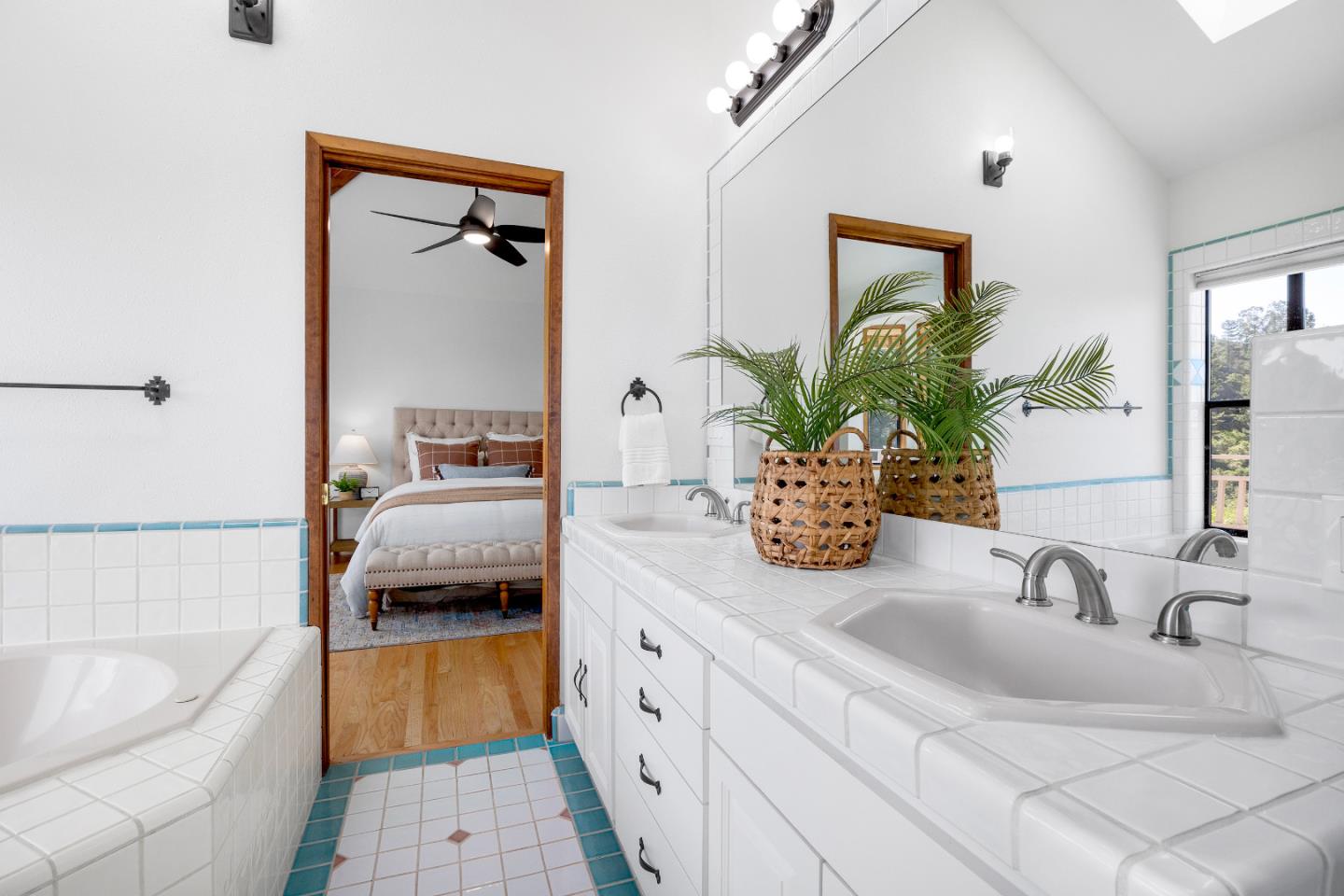 220 Hidden Valley Ridge Soquel, CA 95073 - Photo 23 of 66 a en suite bathroom with a double sink and mirror