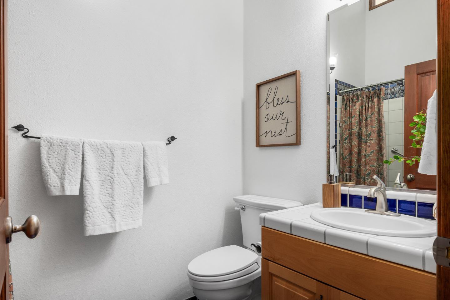 220 Hidden Valley Ridge Soquel, CA 95073 - Photo 29 of 66 a bathroom with a sink toilet and shower