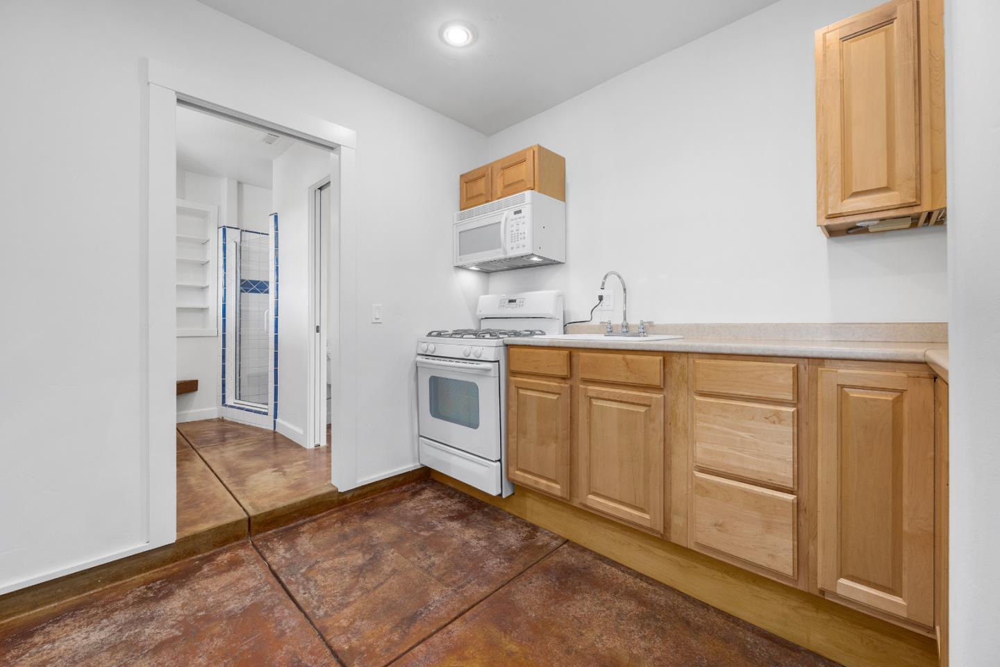 220 Hidden Valley Ridge Soquel, CA 95073 - Photo 36 of 66 a view of a kitchen with white cabinets
