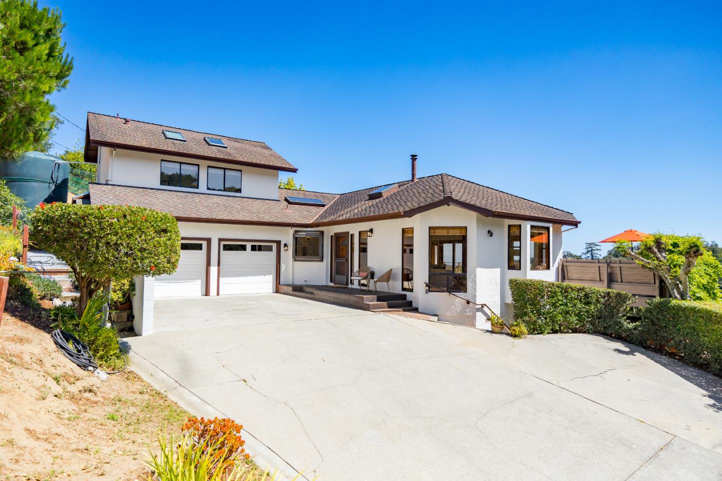 220 Hidden Valley Ridge Soquel, CA 95073 - Photo 4 of 66 a front view of a house with a yard