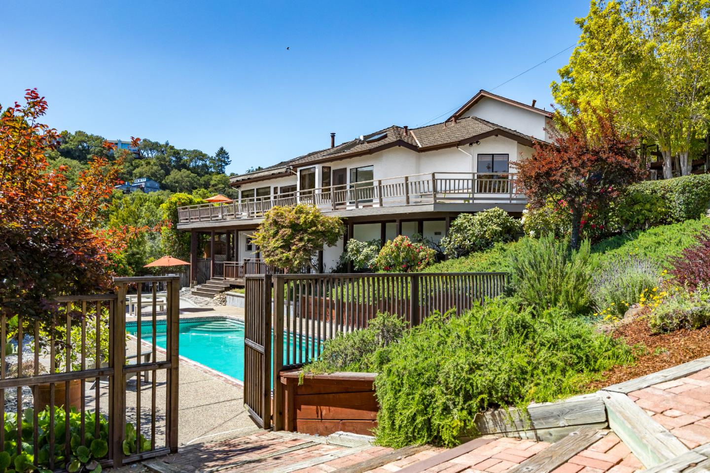 220 Hidden Valley Ridge Soquel, CA 95073 - Photo 41 of 66 a front view of a house with a garden