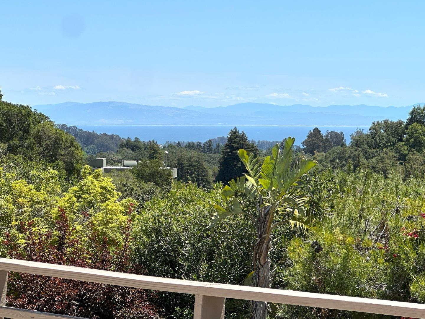 220 Hidden Valley Ridge Soquel, CA 95073 - Photo 47 of 66 a view of a city with lush green forest