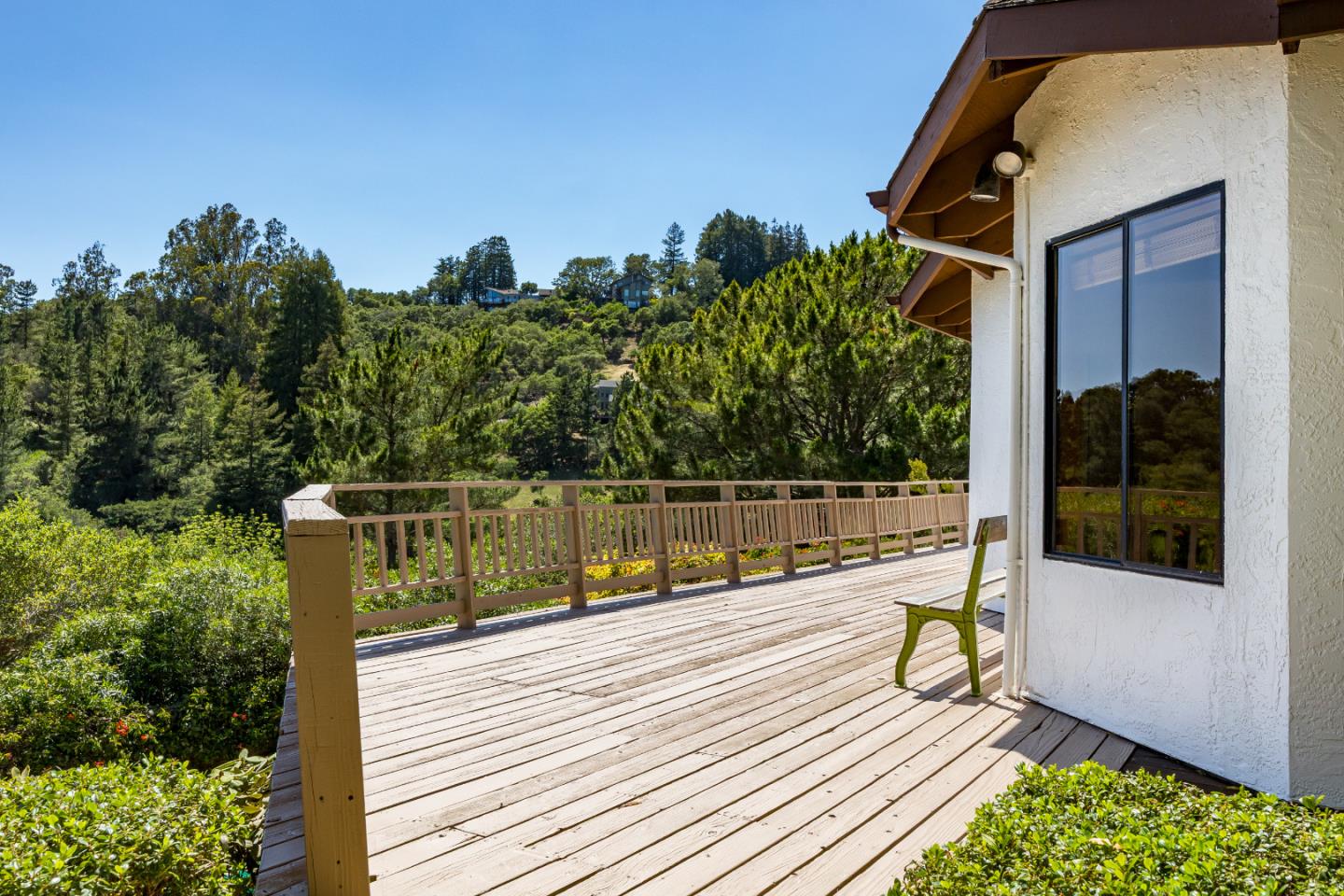 220 Hidden Valley Ridge Soquel, CA 95073 - Photo 48 of 66 a view of a balcony with wooden floor and fence and a yard