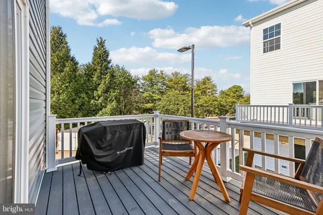 a view of balcony with furniture