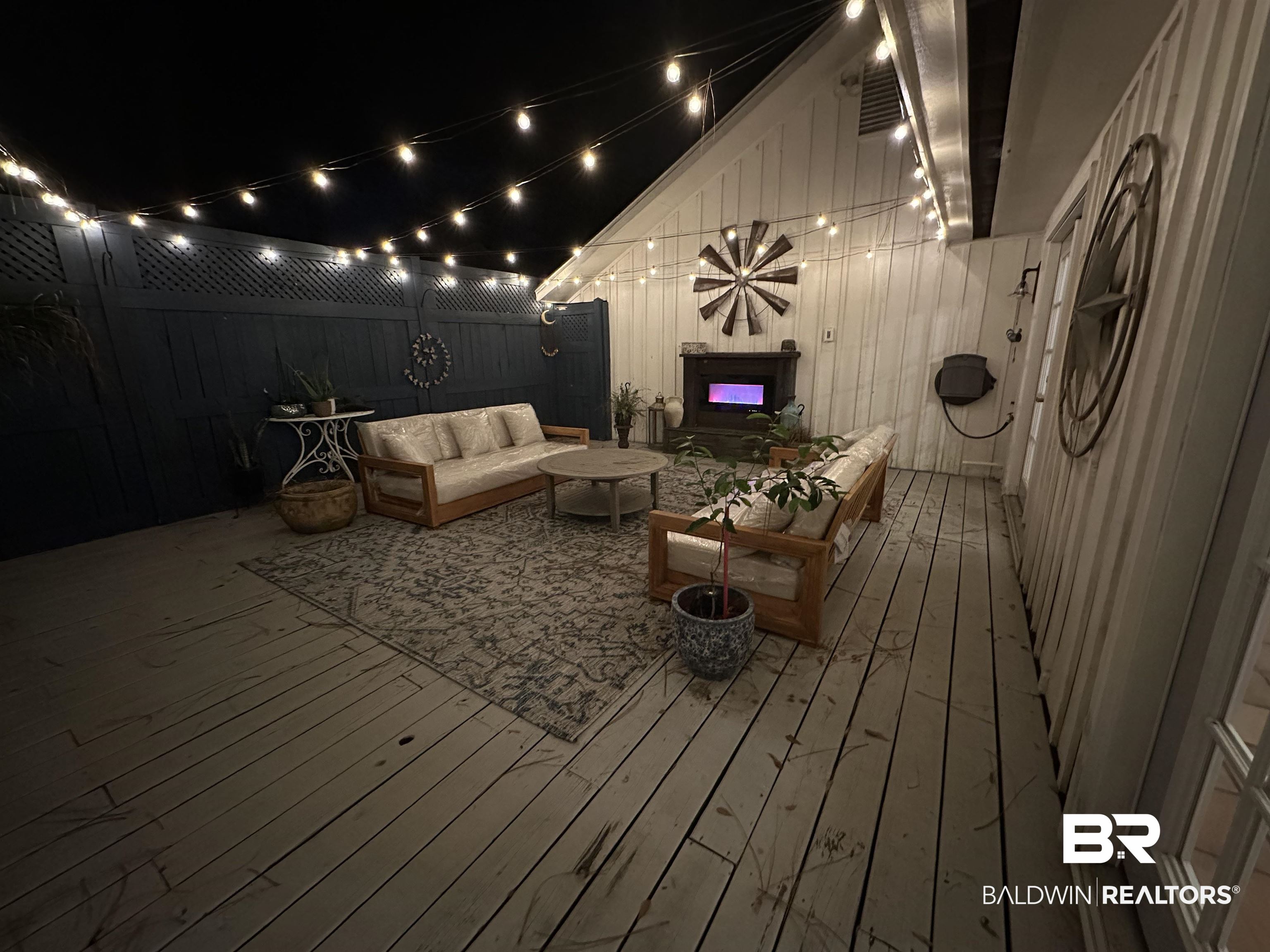 494 Ridgewood Drive Daphne, AL 36526 - Photo 37 of 40 Wooden terrace with an outdoor hangout area