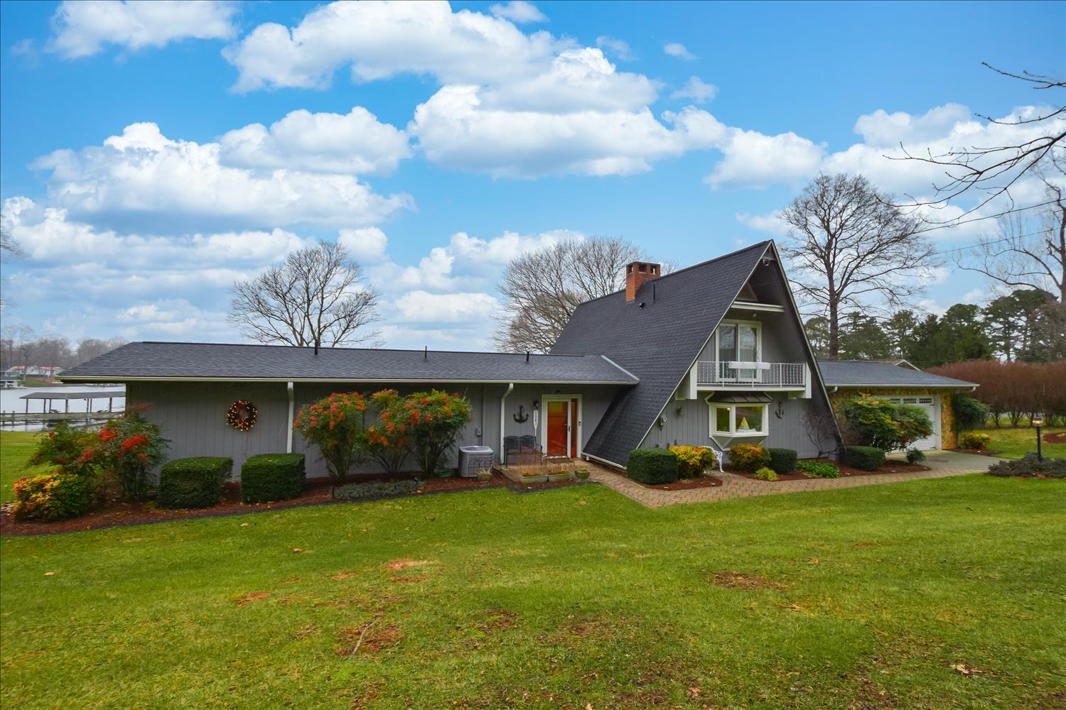 1083 Highland Lake Road Union Hall, VA 24176 - Photo 22 of 38 a front view of house with yard and green space