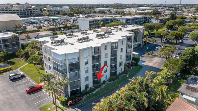 a view of city from balcony with outdoor seating