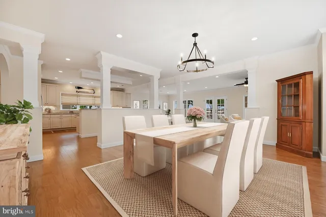 a view of kitchen with sink and refrigerator