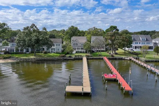 a view of a lake with a house next to a lake